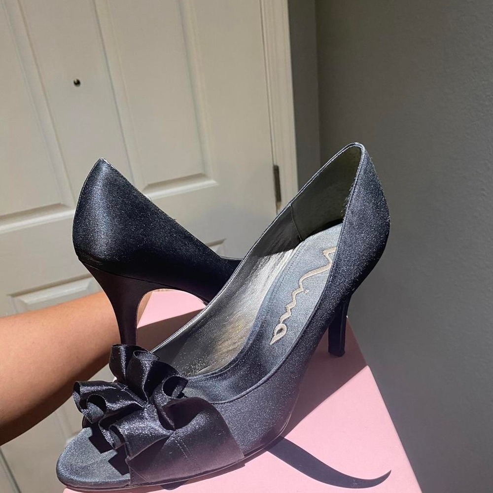 Nina black satin peep toe heels with bow detail. Size US 9
